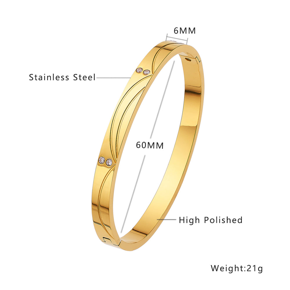 Gewelltes Armband aus Edelstahl mit 18 Karat Goldbeschichtung und Diamanten