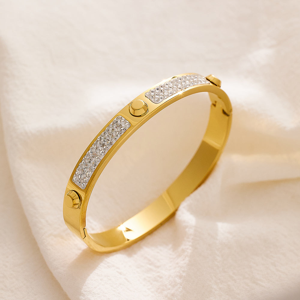 Armband aus Edelstahl mit 18 Karat Gold überzogen und dreifachem Nagelschlamm