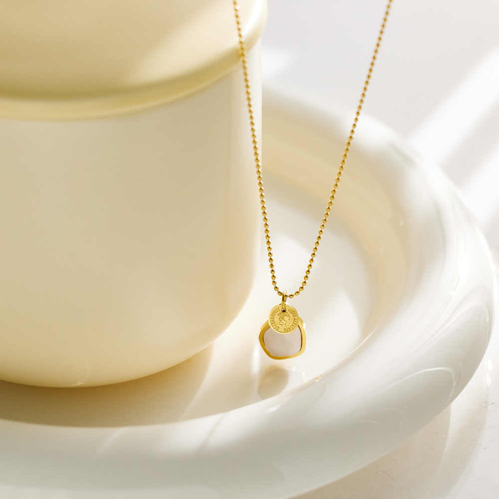 Collier pièce de monnaie en acier inoxydable plaqué or 18 carats