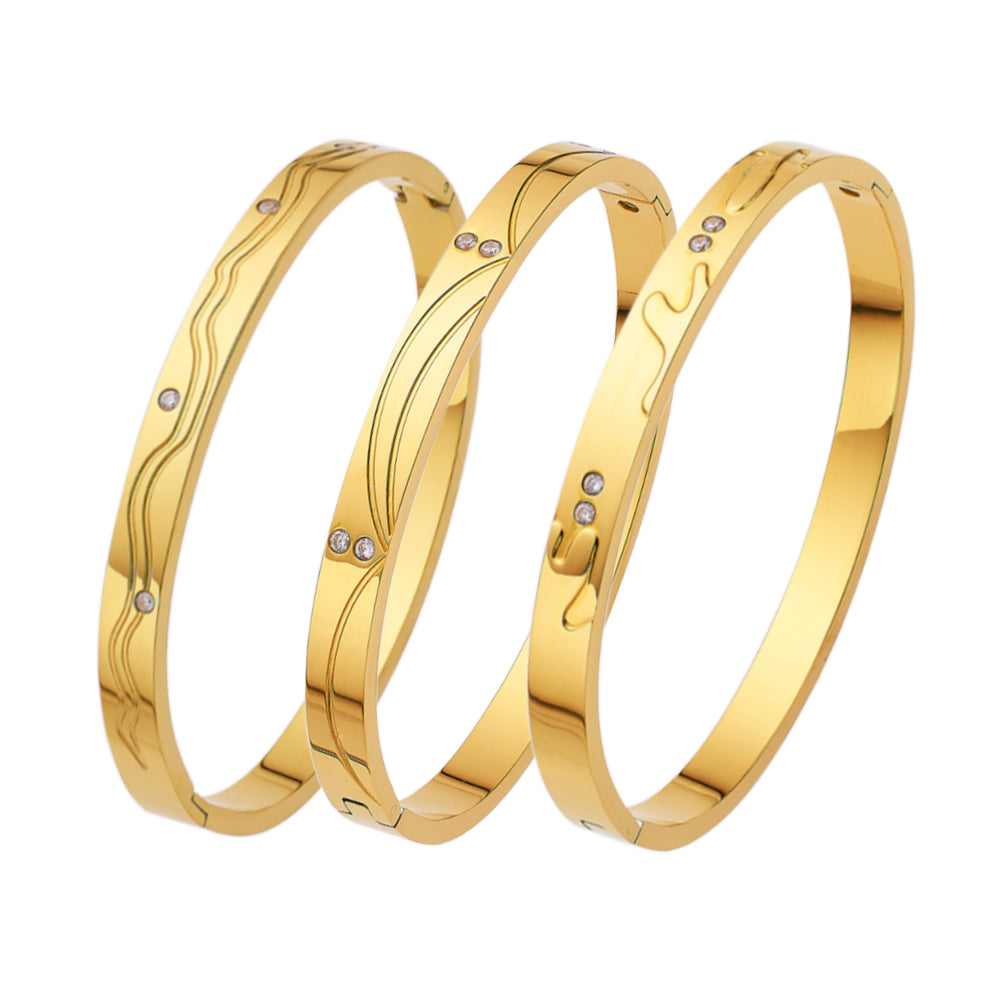 Gewelltes Armband aus Edelstahl mit 18 Karat Goldbeschichtung und Diamanten