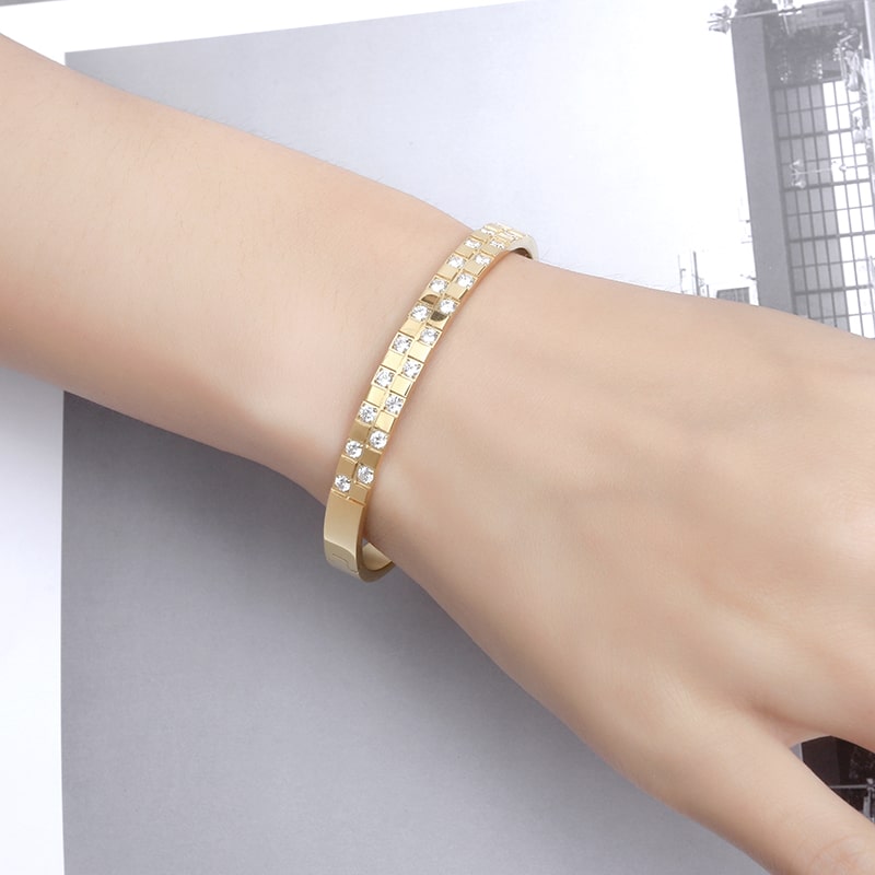 Bracelet en acier inoxydable plaqué or 18 carats avec deux rangées de zircons carrés