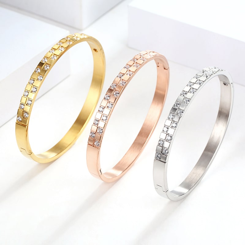 Bracelet en acier inoxydable plaqué or 18 carats avec deux rangées de zircons carrés