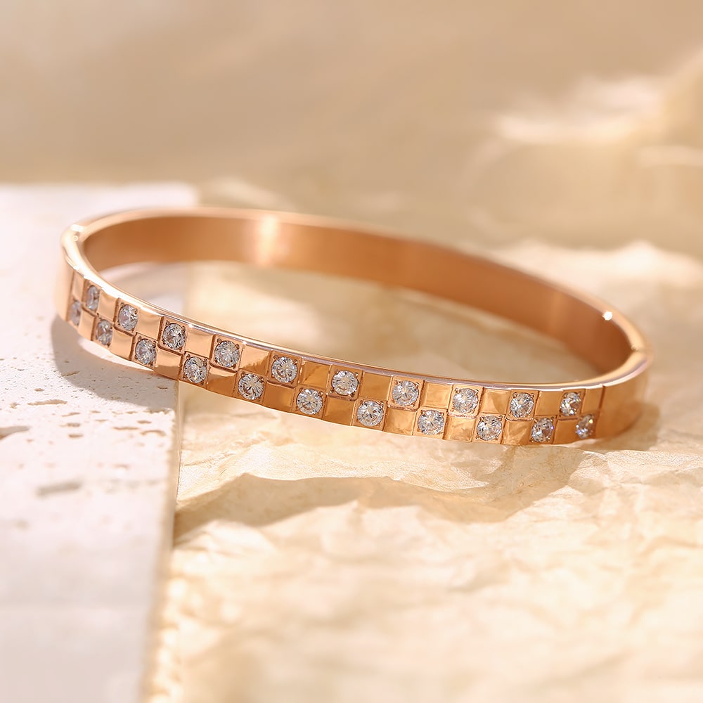 Bracelet en acier inoxydable plaqué or 18 carats avec deux rangées de zircons carrés