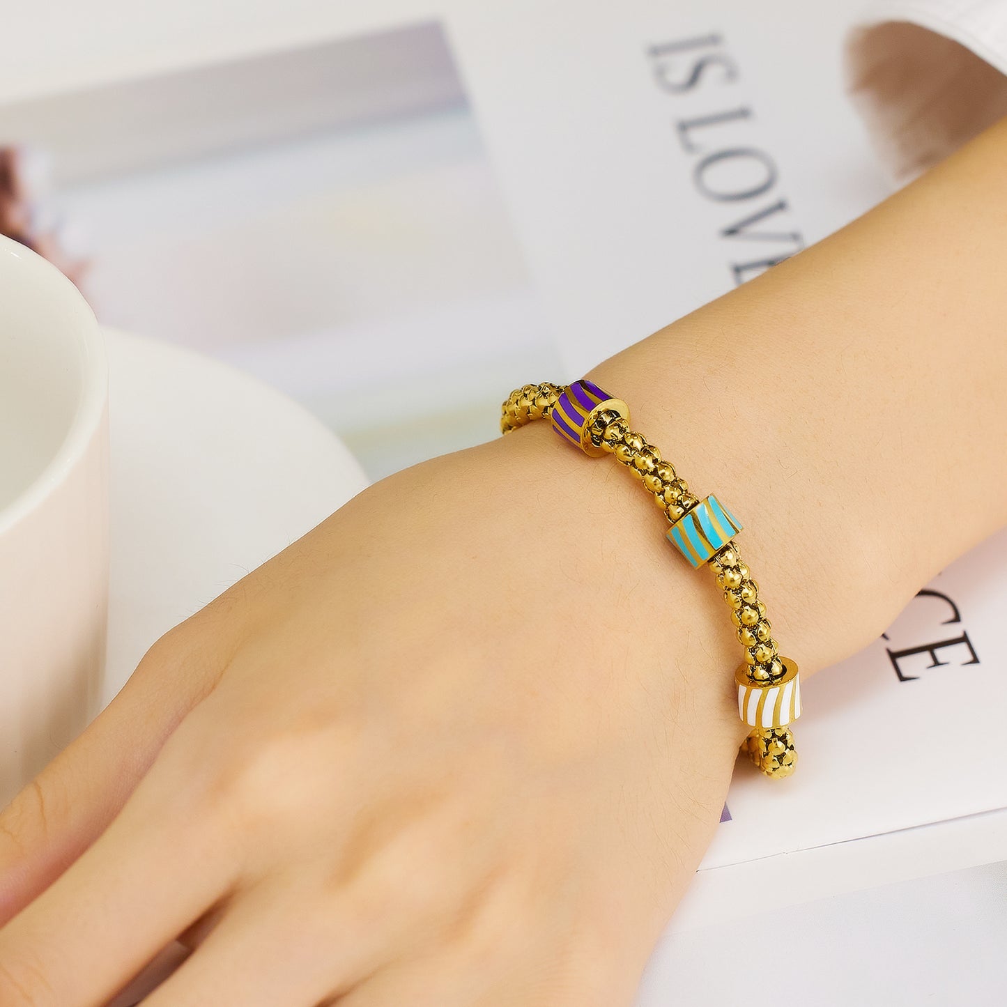 Dreifarbiges Armband aus Edelstahl mit 18 Karat Goldauflage