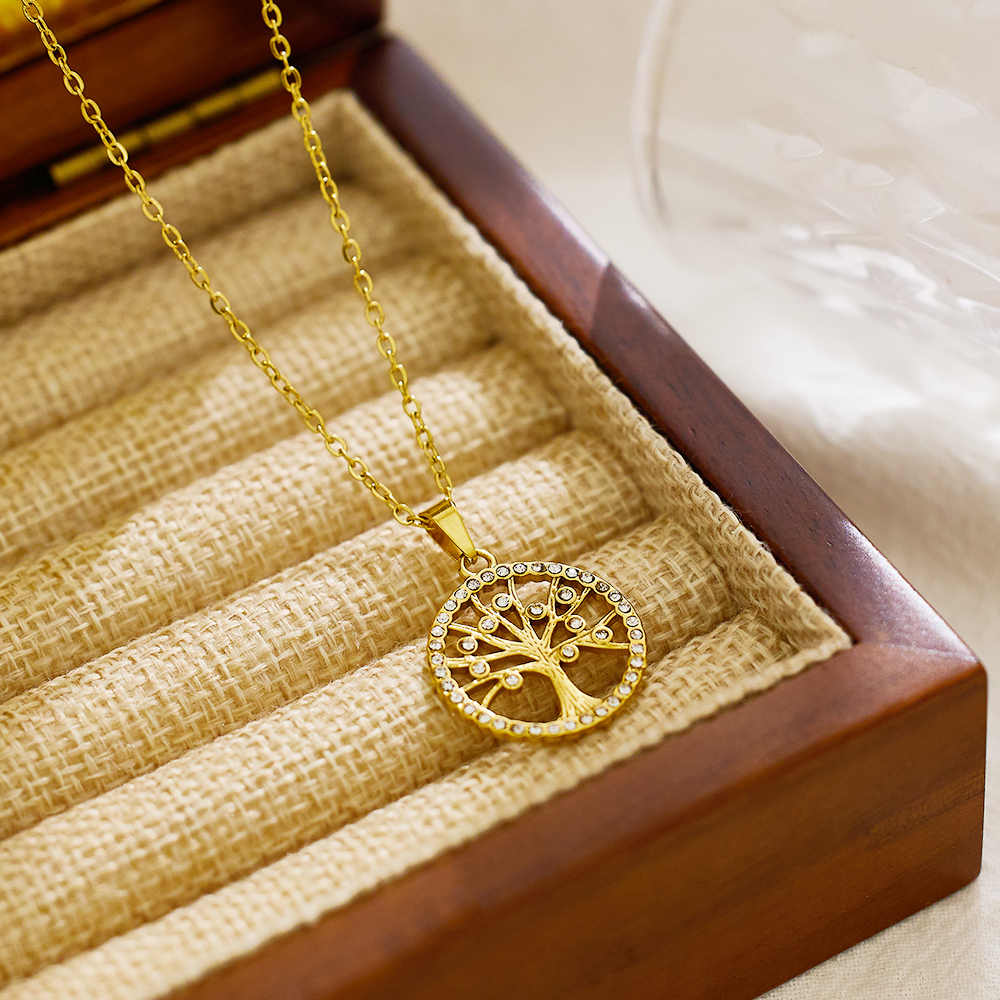 Collier arbre de vie creux en acier inoxydable plaqué or 18 carats