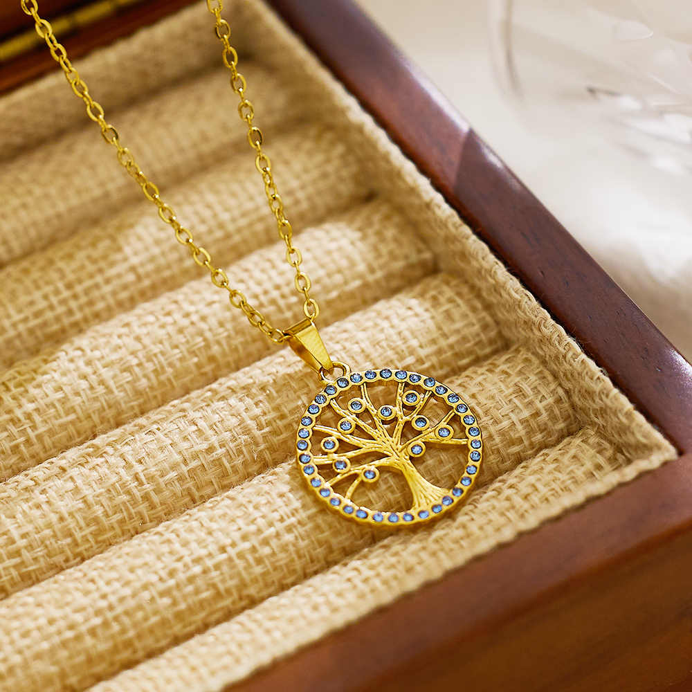 Collier arbre de vie creux en acier inoxydable plaqué or 18 carats