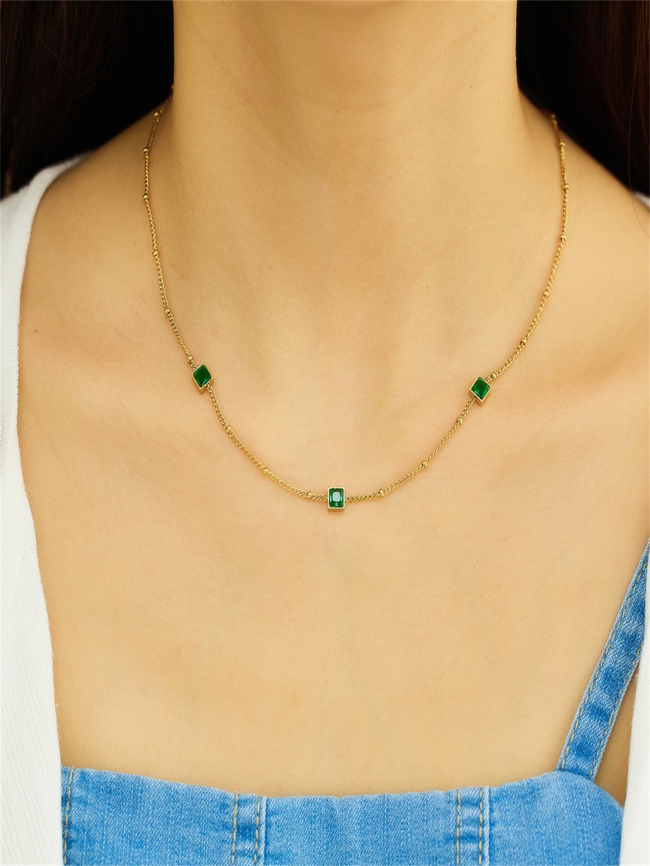 Collier en acier inoxydable et zircons plaqués or 18 carats