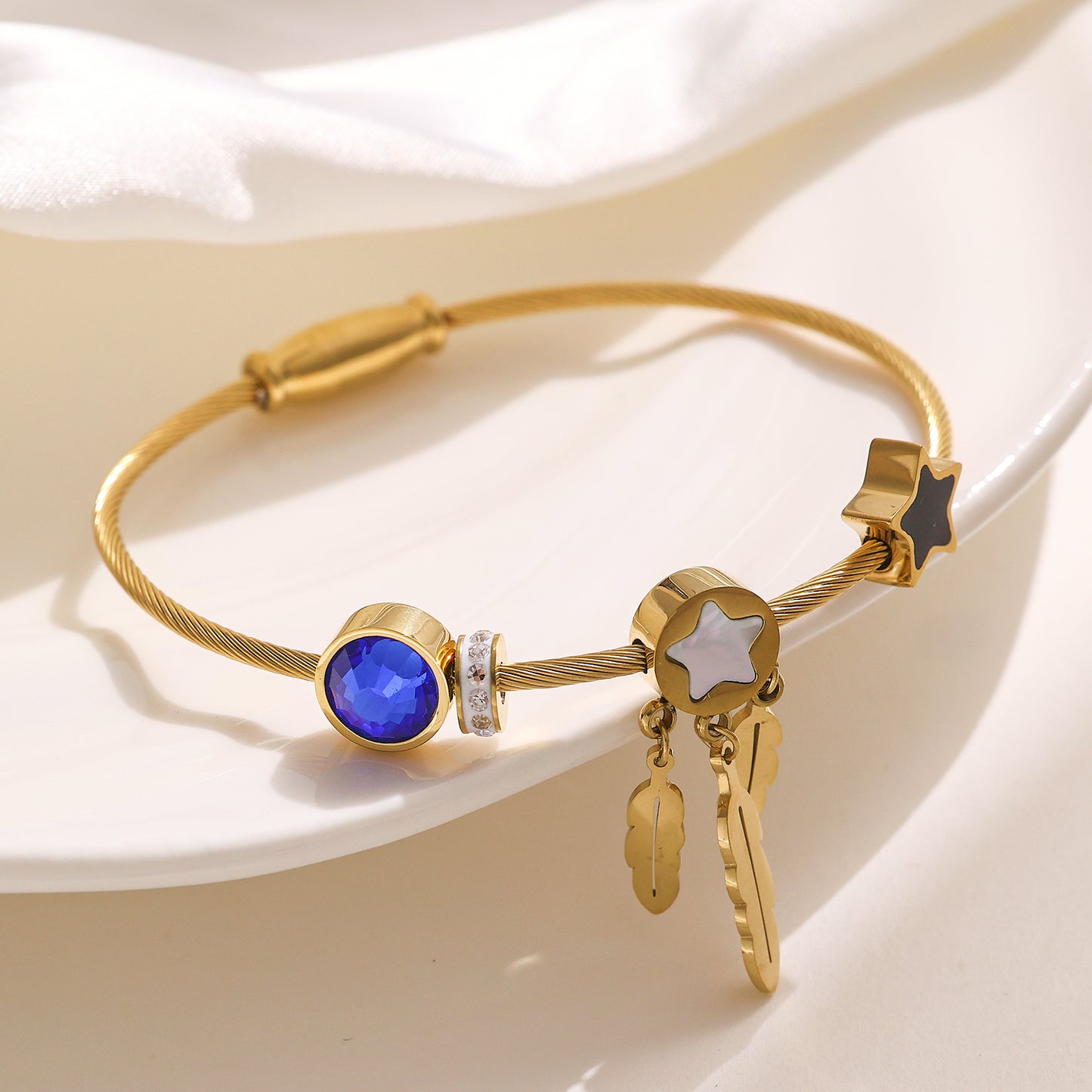 Stainless steel plated gold bracelet with 18K stars