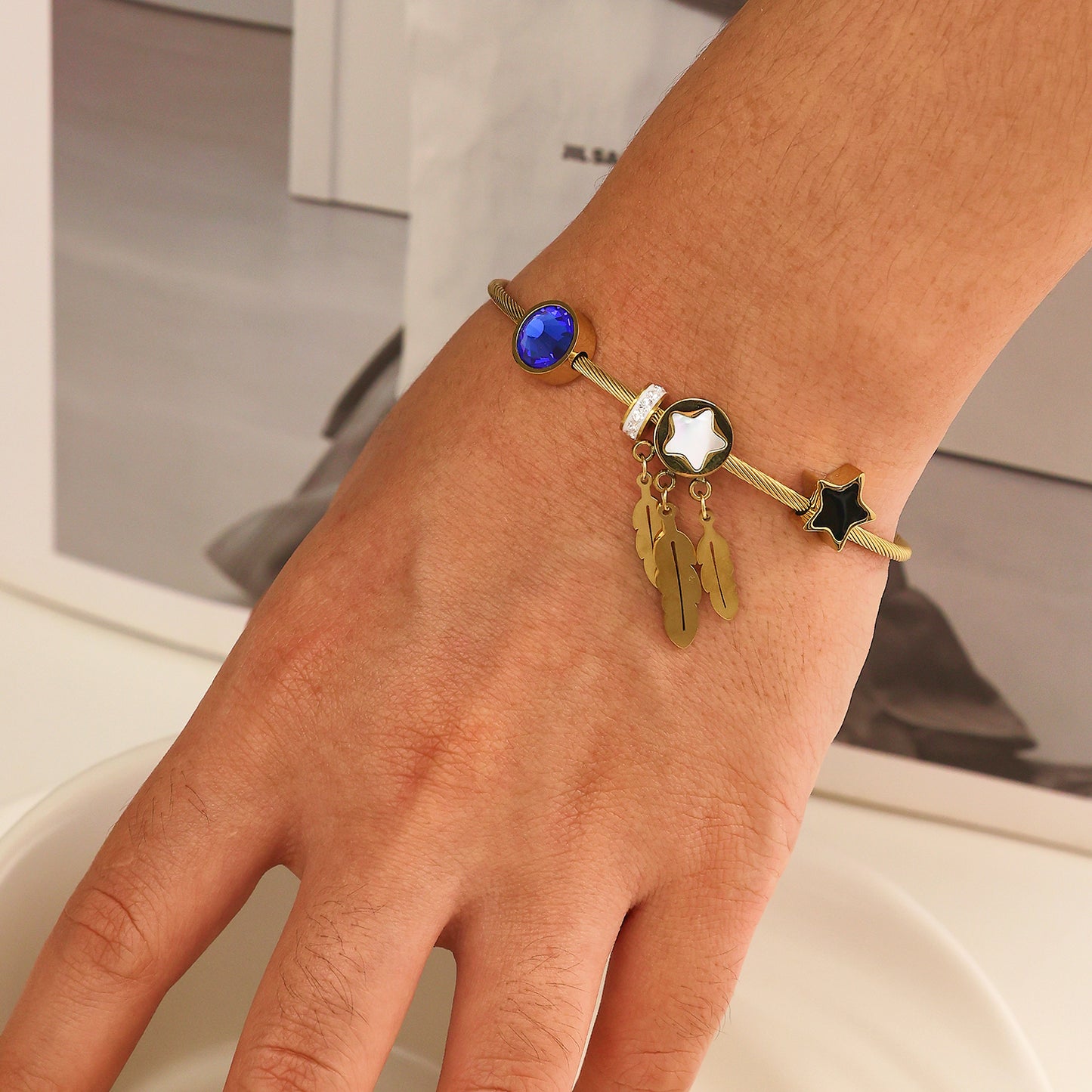 Stainless steel plated gold bracelet with 18K stars