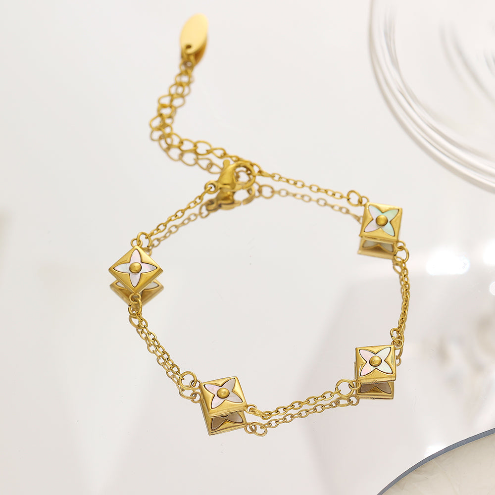 Armband aus Edelstahl mit 18 Karat Goldbeschichtung im Stil eines vierblättrigen Kleeblatts