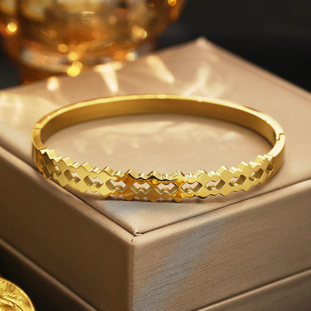 Bracelet doré vintage français en acier inoxydable plaqué or 18 carats