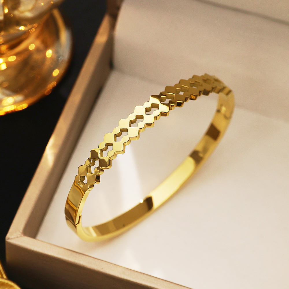 Bracelet doré vintage français en acier inoxydable plaqué or 18 carats