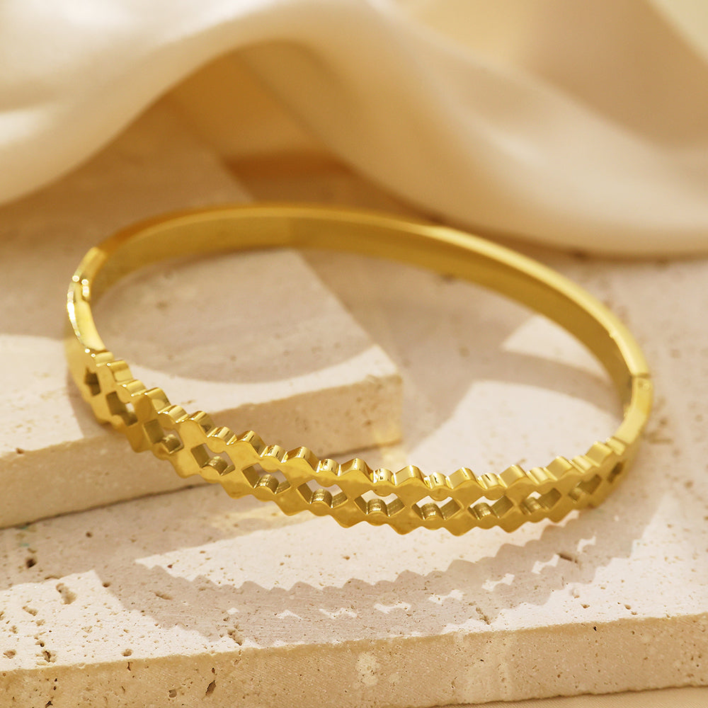 Bracelet doré vintage français en acier inoxydable plaqué or 18 carats