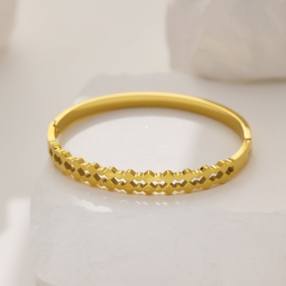 Bracelet doré vintage français en acier inoxydable plaqué or 18 carats