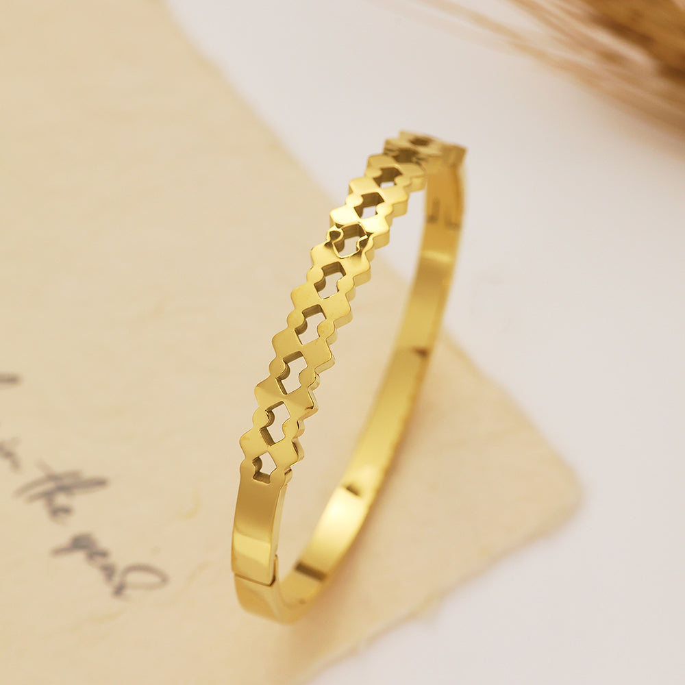 Bracelet doré vintage français en acier inoxydable plaqué or 18 carats