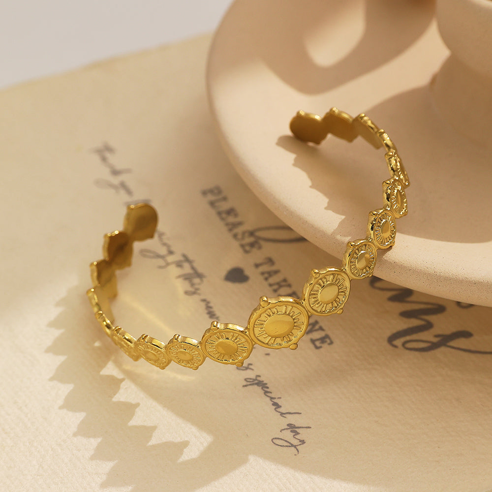 Bracelet ouvert en acier inoxydable plaqué or 18 carats