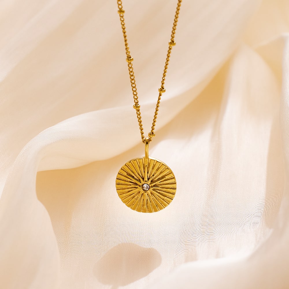 Collier tendance avec pendentif en forme d'étoile à huit branches plaqué or 18 carats
