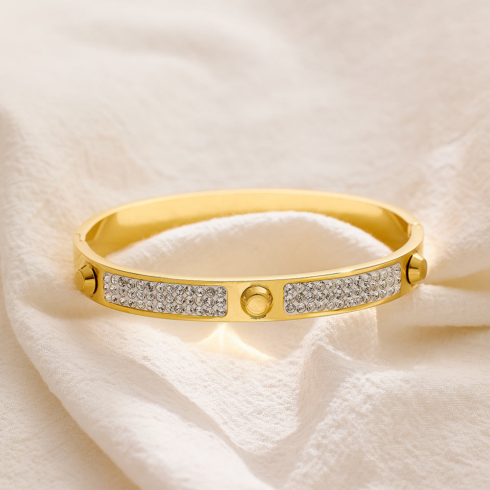 Armband aus Edelstahl mit 18 Karat Gold überzogen und dreifachem Nagelschlamm