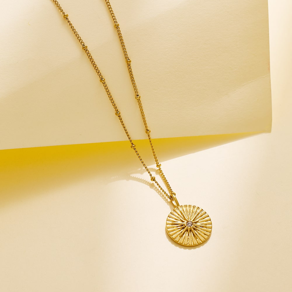 Collier tendance avec pendentif en forme d'étoile à huit branches plaqué or 18 carats