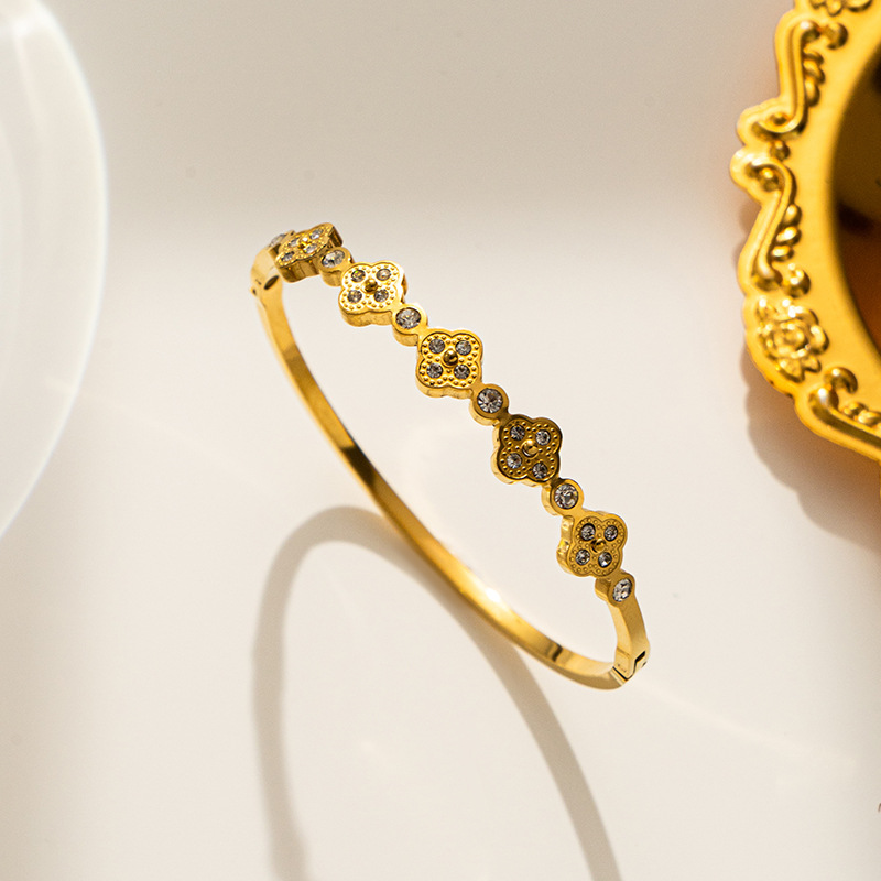 Stainless steel 18K gold-plated four-leaf zircon bangle