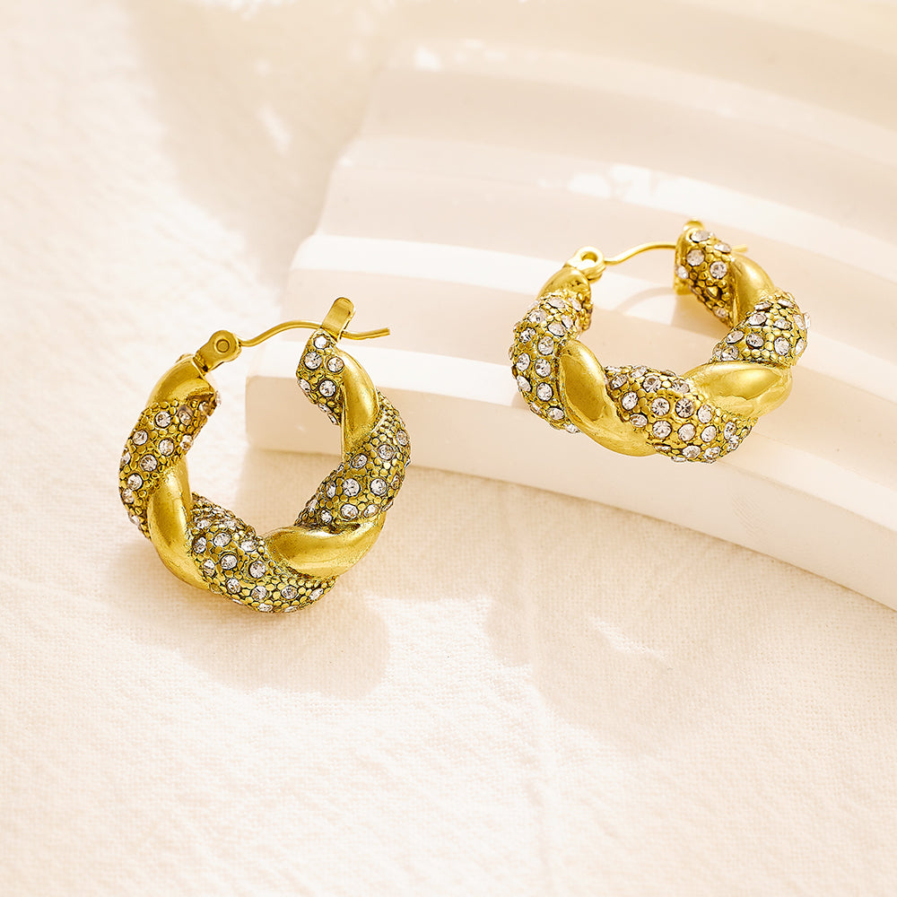 Stainless steel plated 18-karat gold twist earrings with diamond