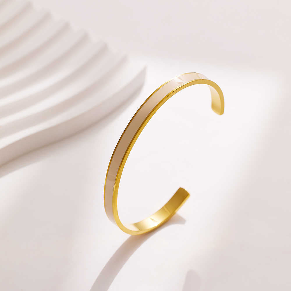 Stainless steel 18K gold plated flange drops bangle