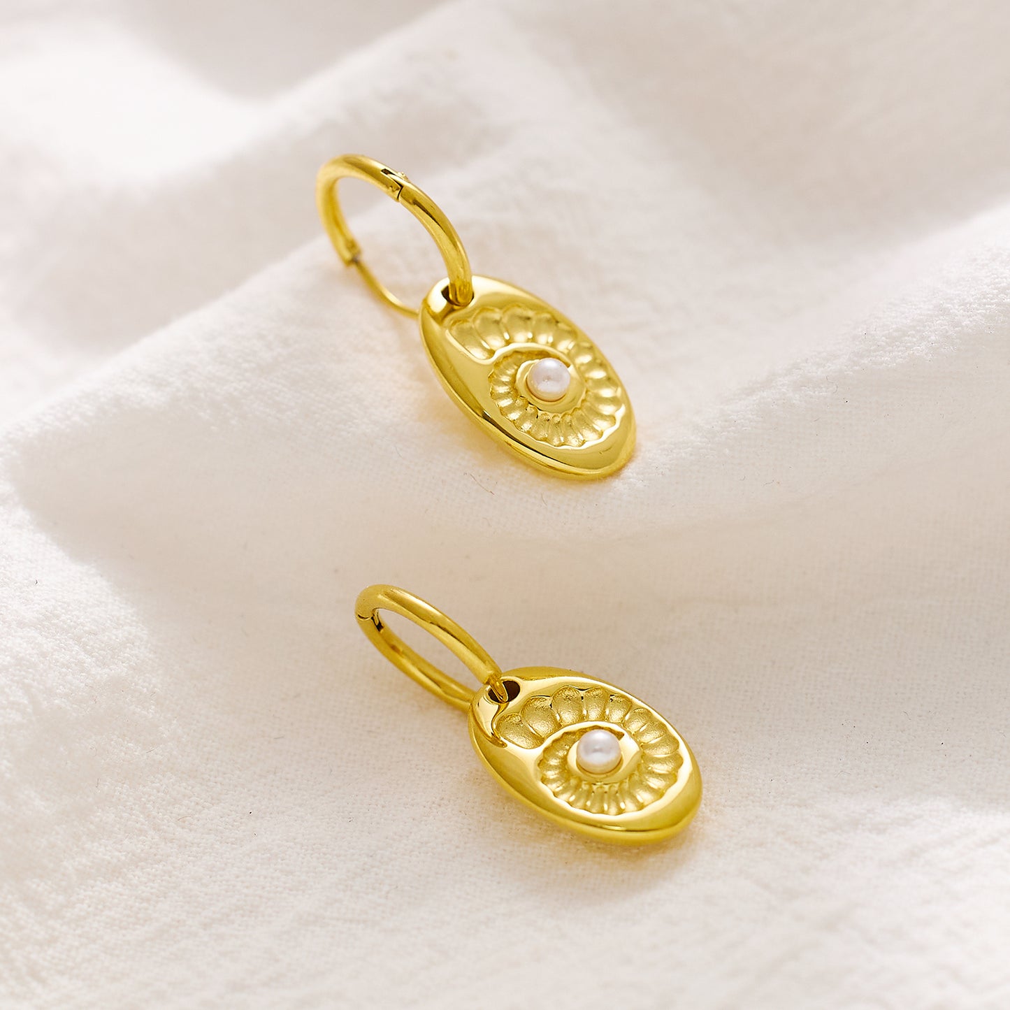 Stainless steel plated 18-karat gold shell earrings