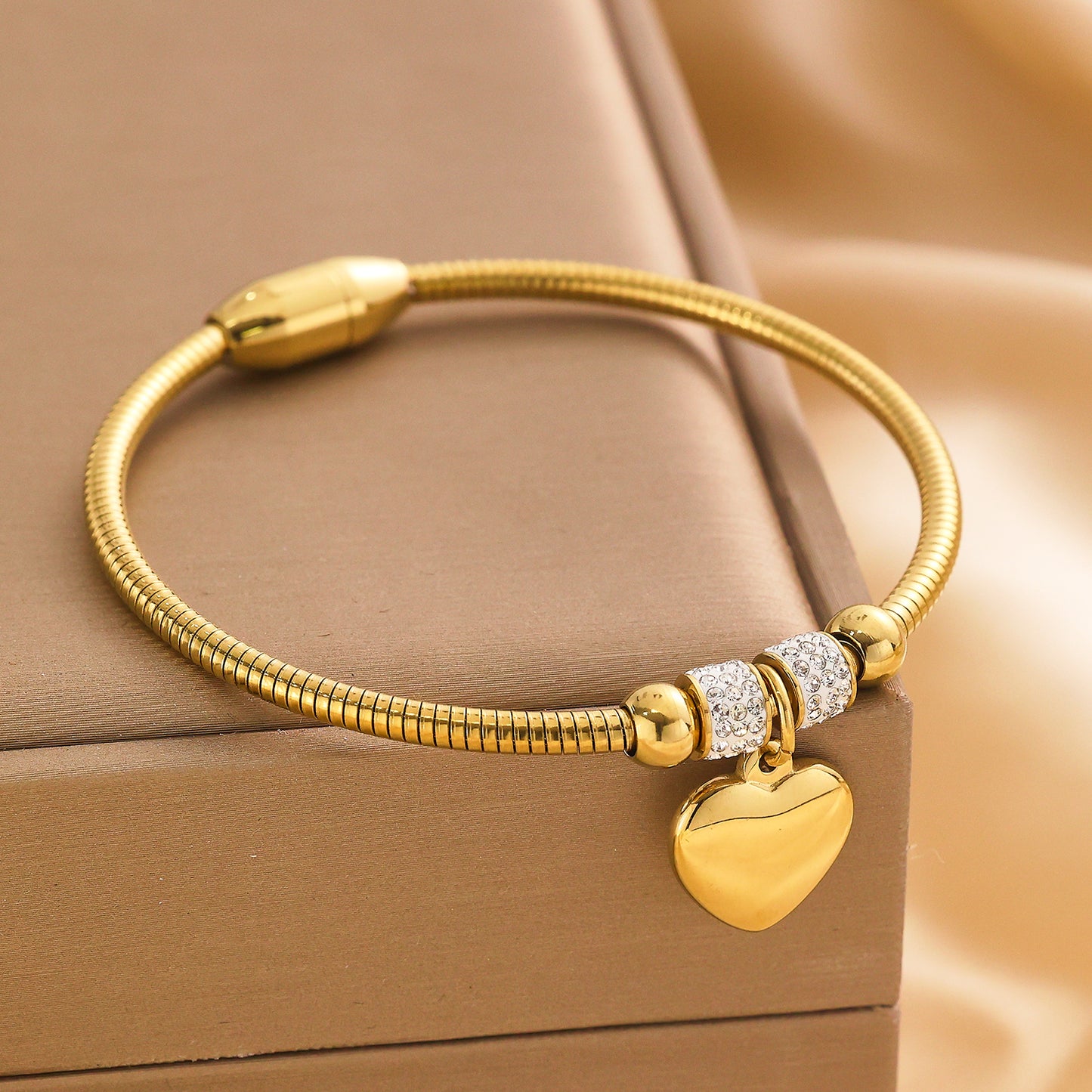 Stainless steel plated gold bracelet with 18K heart