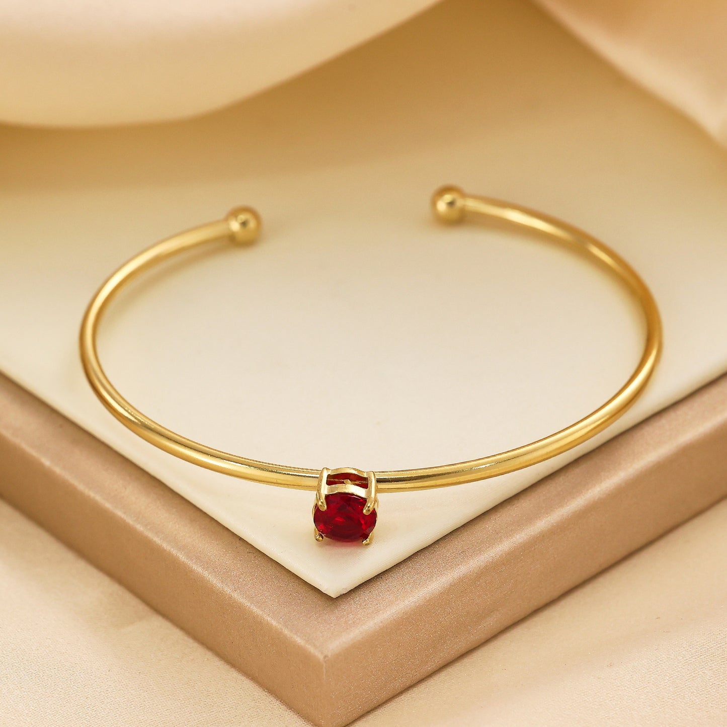 Stainless steel plated red diamond bracelet with 18 karat gold