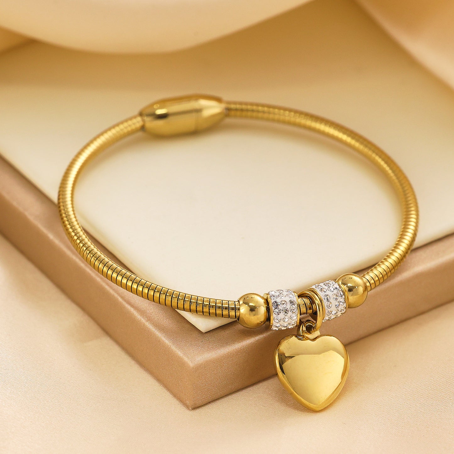 Stainless steel plated gold bracelet with 18K heart