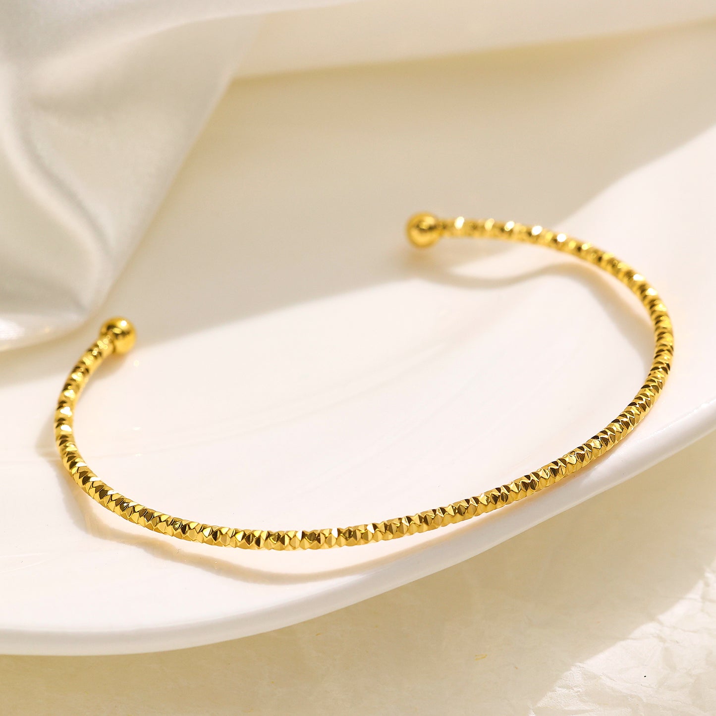 Stainless steel plated 18K gold small embossed bracelet