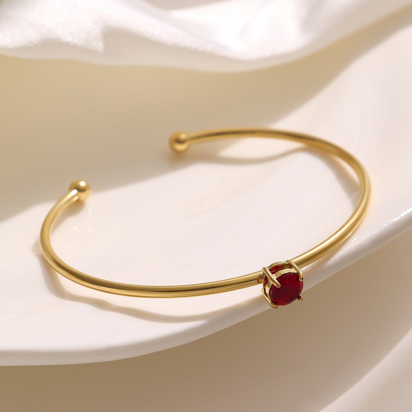 Stainless steel plated red diamond bracelet with 18 karat gold