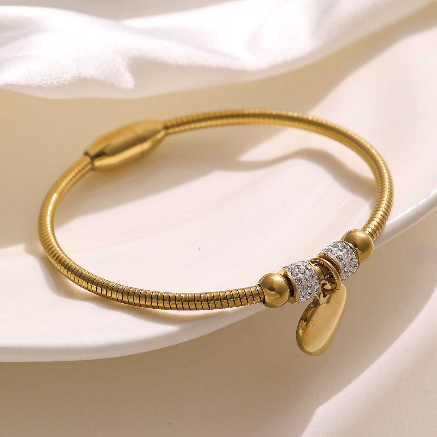 Stainless steel plated gold bracelet with 18K heart