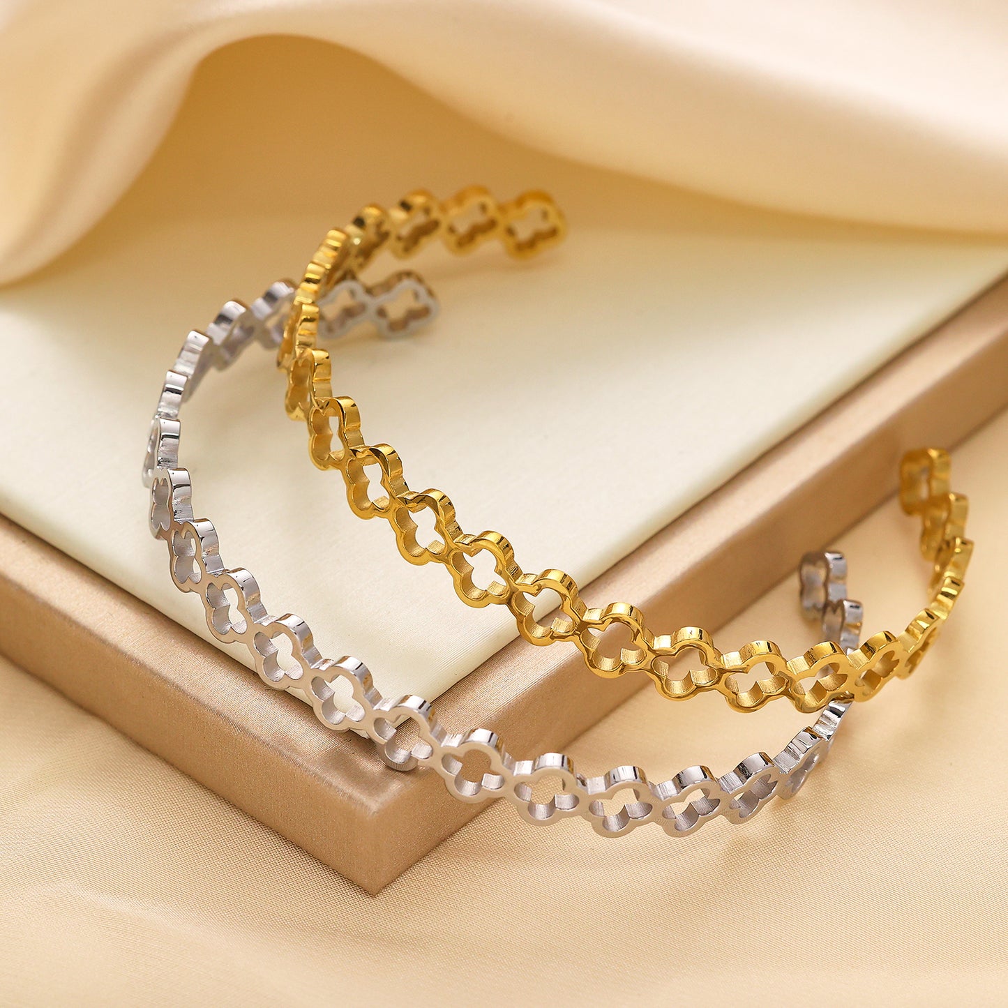 Stainless steel plated 18-karat gold half-open bracelet