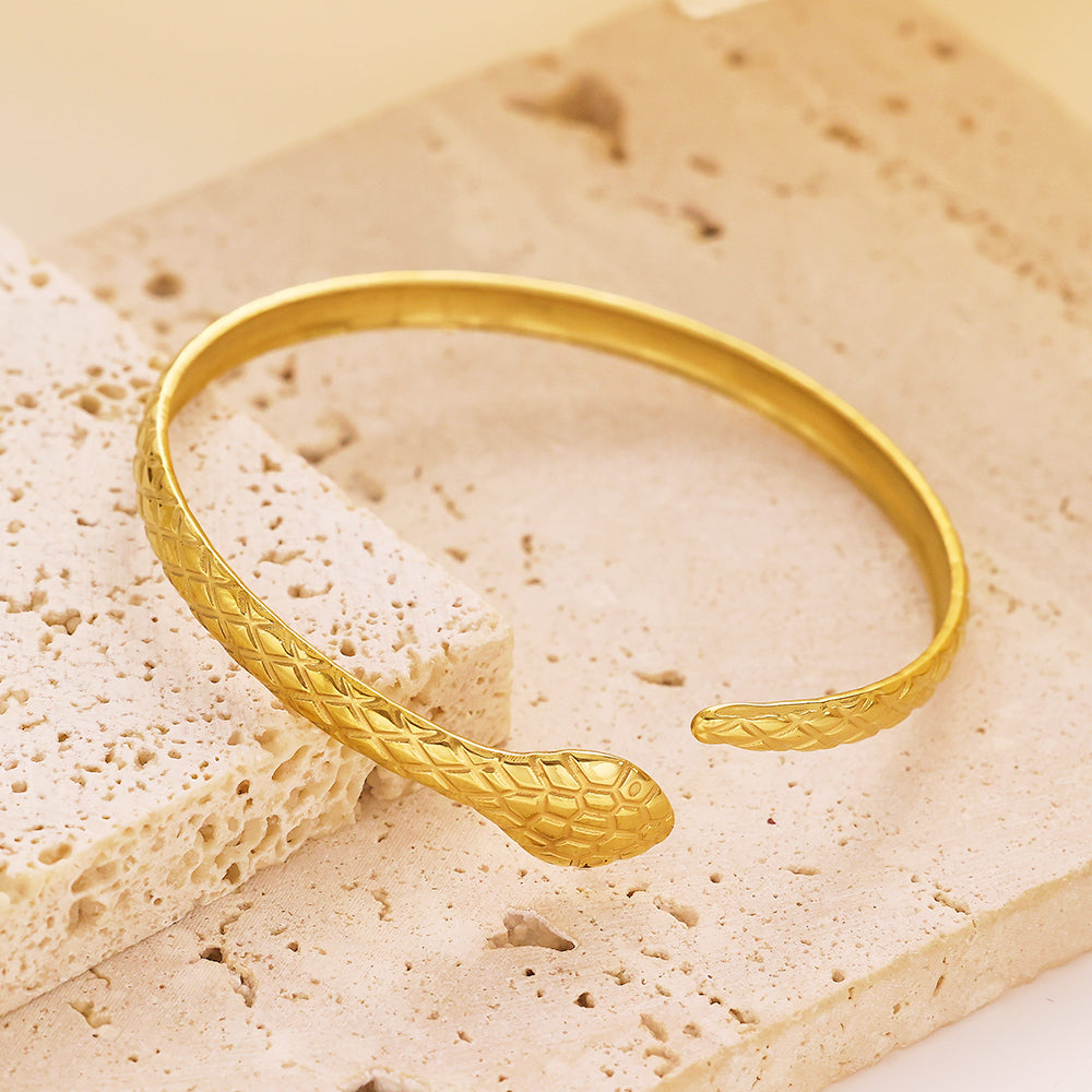 Gold snake-shaped bracelet in stainless steel plated with 18 karat gold