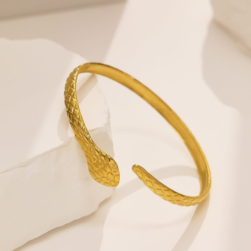 Gold snake-shaped bracelet in stainless steel plated with 18 karat gold