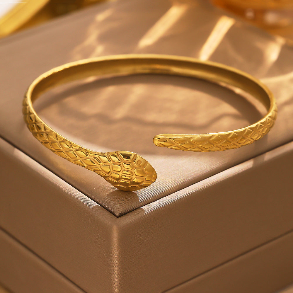 Gold snake-shaped bracelet in stainless steel plated with 18 karat gold