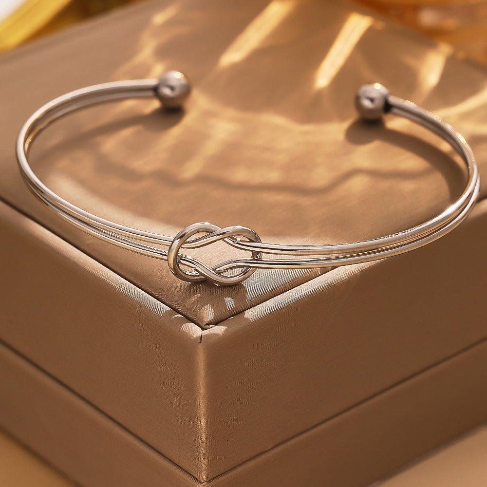 Stainless steel plated 18-karat gold semi-closed knot gold bracelet