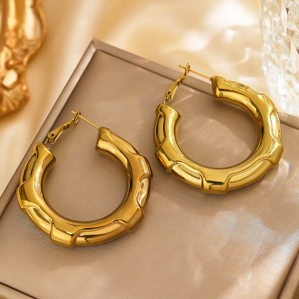 Stainless steel plated 18-karat gold hexagonal semi-closed loop earrings