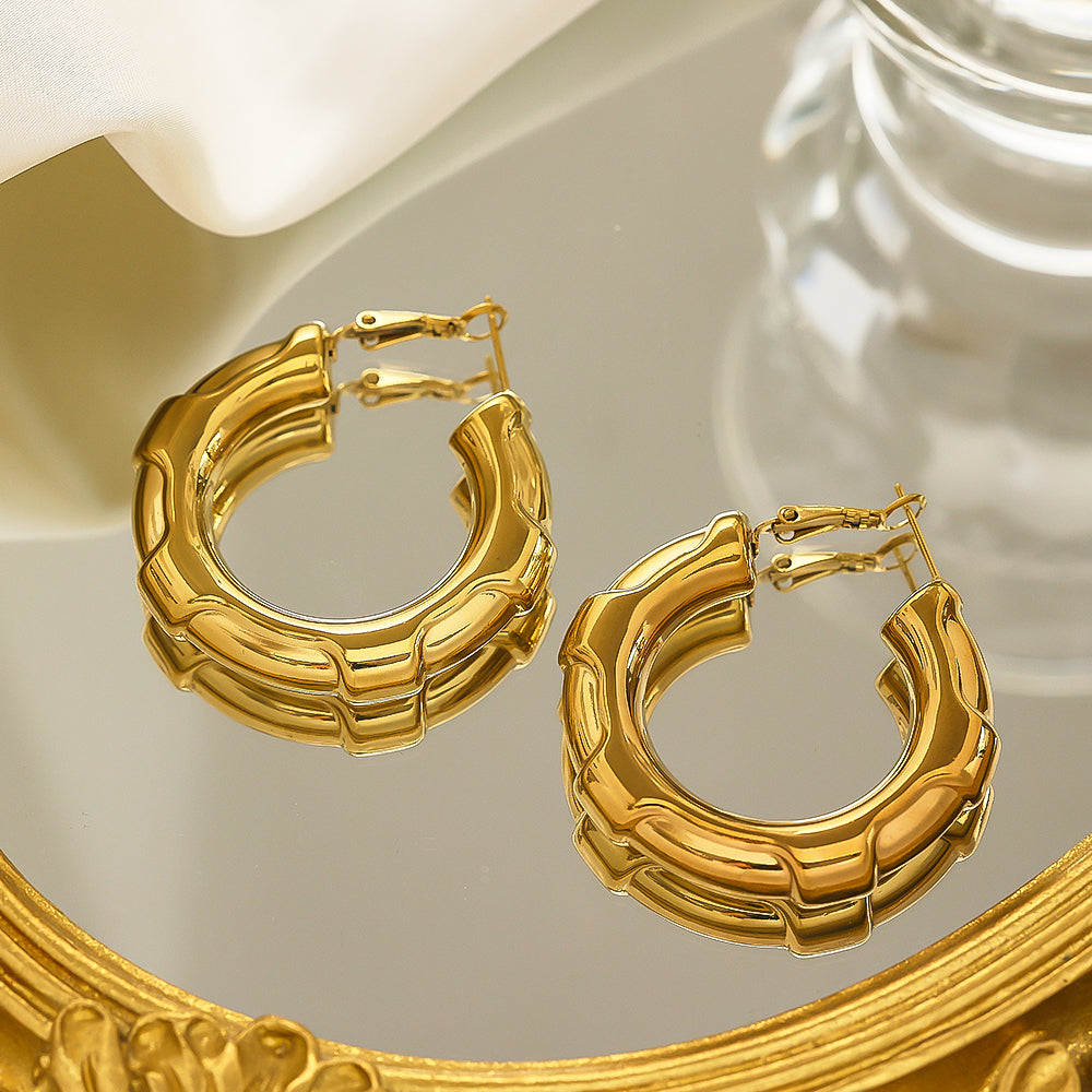 Stainless steel plated 18-karat gold hexagonal semi-closed loop earrings