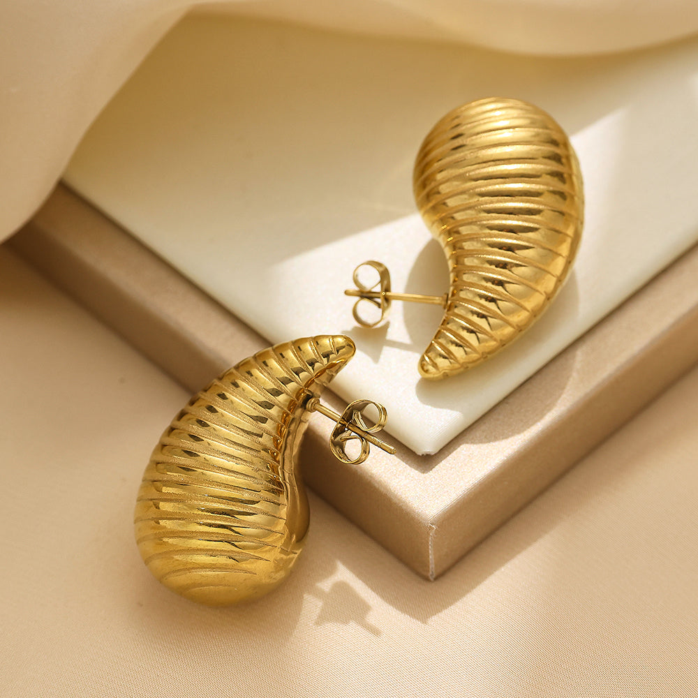 Stainless steel plated 18-karat gold wavy drop earrings