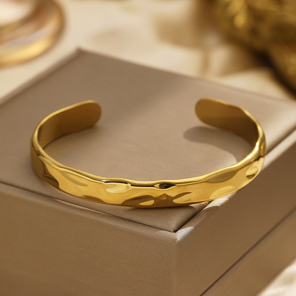 Stainless steel plated 18-karat gold embossed gold bracelet